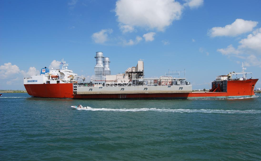 Image of power barges leaving Corpus Christi, Texas